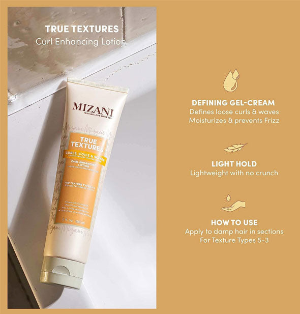 Bottle of Mizani True Textures Curl Enhancing Lotion rests on the edge of a bath tub alongside its labeled key benefits and usage suggestion