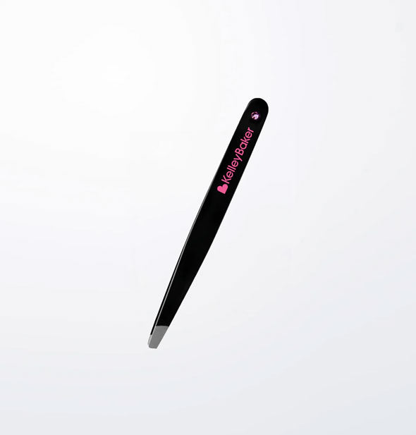 Black tweezers with steel tips and pink Kelley Baker logo with Swarovski crystal accent