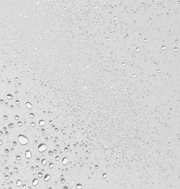 Dermalogica UltraCalming Mist droplets on a gray surface
