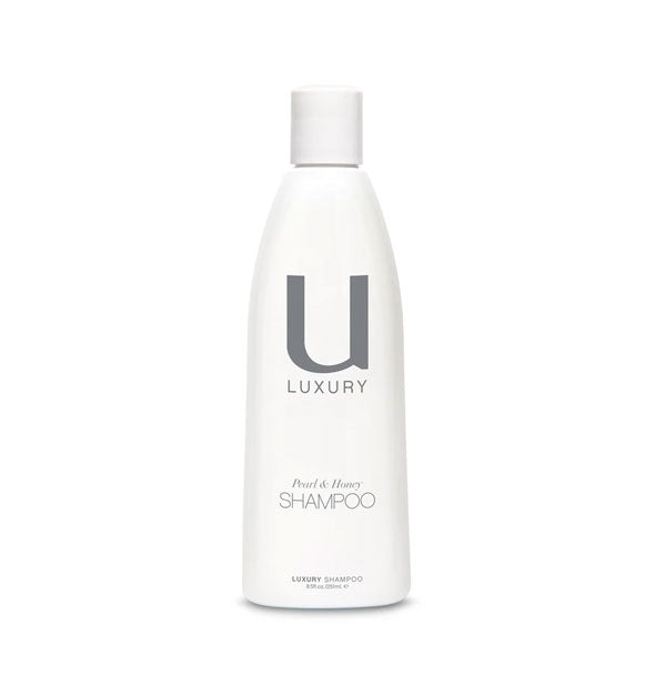 White 8 ounce bottle of Unite U Luxury Pearl & Honey Shampoo