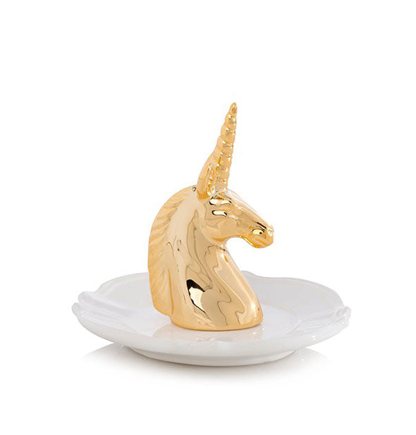 White dish with central gold unicorn bust