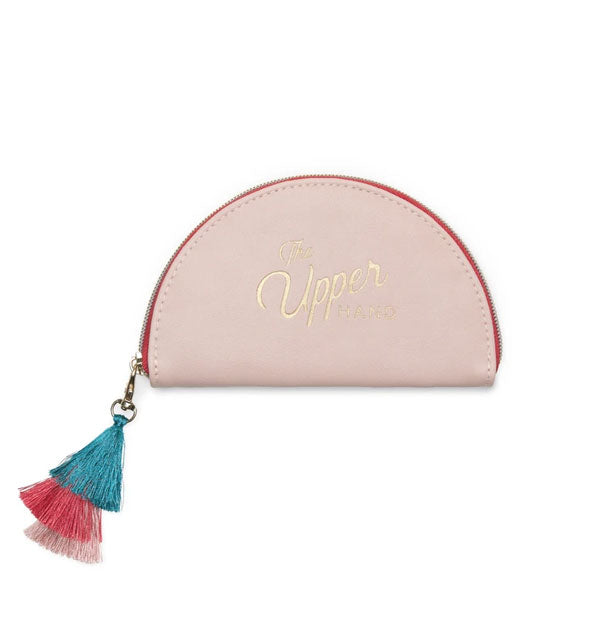 Half-circle blush pink zippered pouch with tricolor tassel says, "Upper Hand" in metallic gold foil lettering