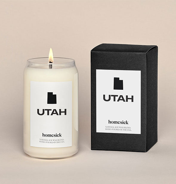 Clear glass Utah candle by Homesick next to black and white box packaging
