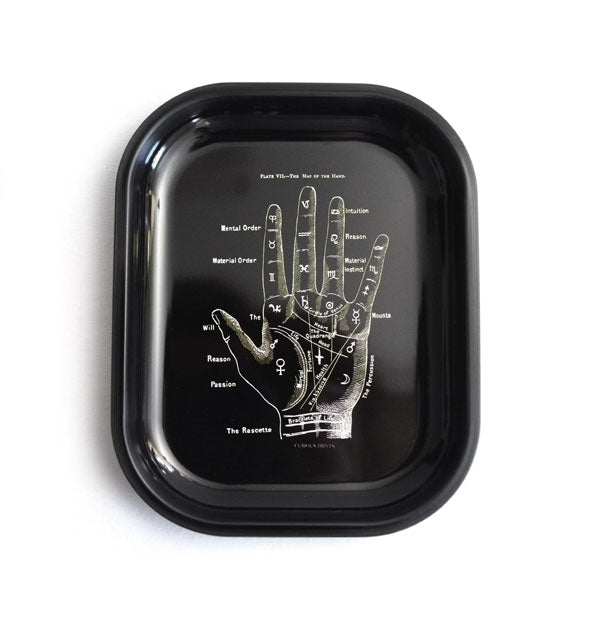 Rectangular black tray with rounded corners features a white vintage diagrammed illustration of a palmistry hand map
