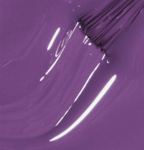 Purple nail polish with brush tip
