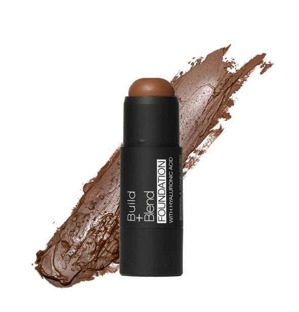 Black stick of Build + Blend Foundation in the shade Warm Brown
