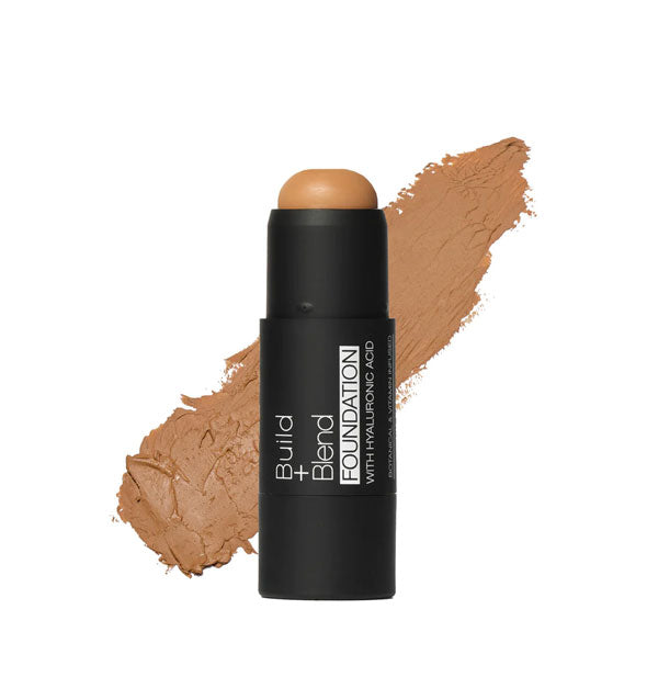 Black stick of Build + Blend Foundation in the shade Warm Caramel