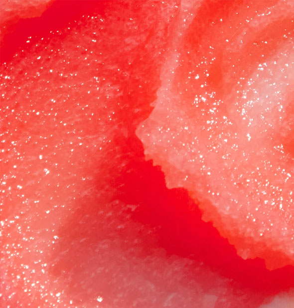 Closeup of deep reddish-pink sugar scrub