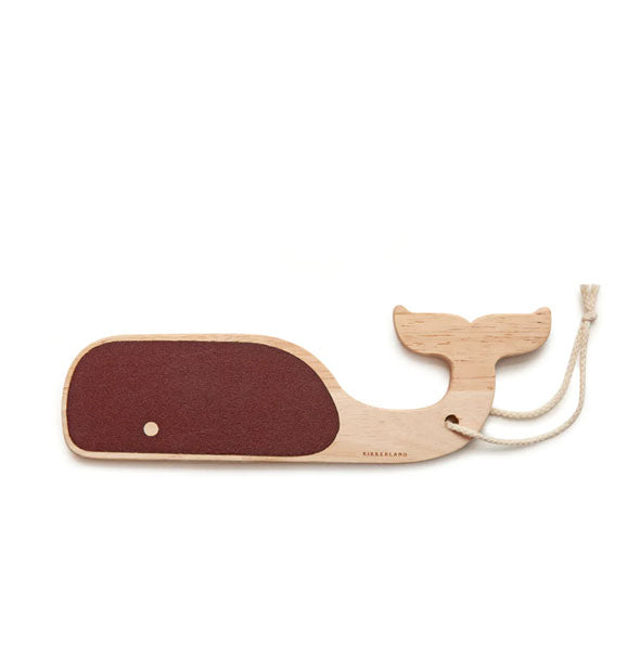 Whale-shaped wooden foot file with rope attached and brown file area with "eye" cutout