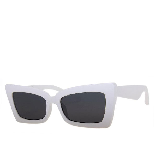 Pair of angular white sunglasses