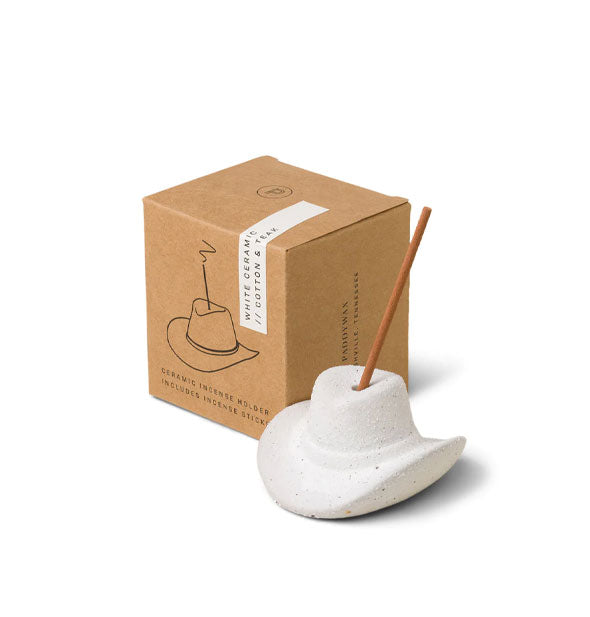 White ceramic cowboy hat incense holder with incense stick and brown box packaging