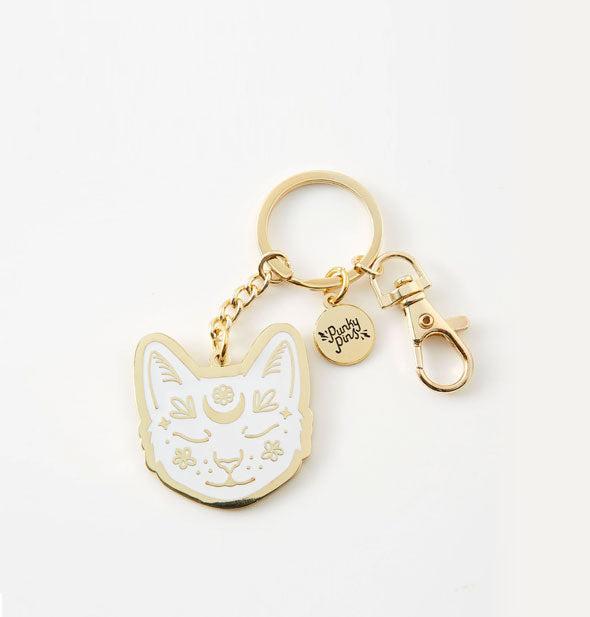 White enamel cat face keychain pendant features gold accents and hardware with claw clasp