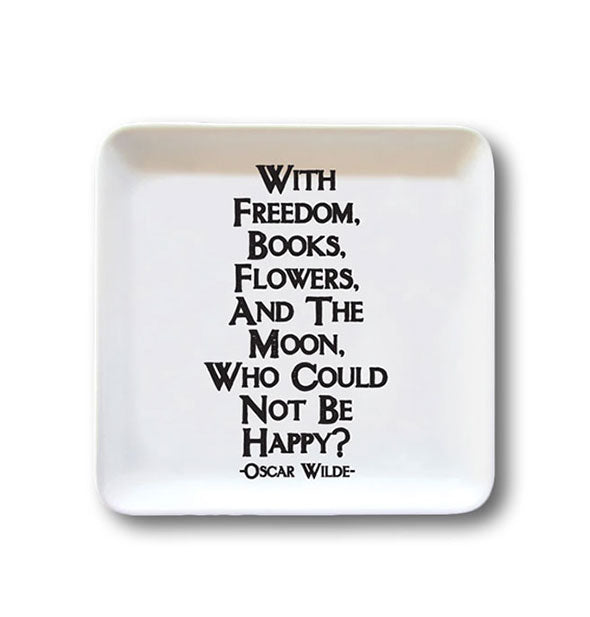 Square white dish with rounded corners is printed with this Oscar Wilde quote: "With freedom, books, flowers, and the moon, who could not be happy?" in black lettering
