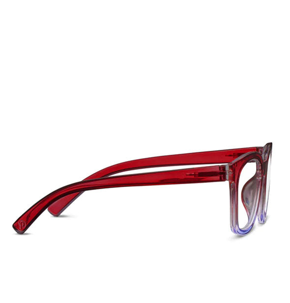 Side view of a pair of clear red and purple gradient glasses