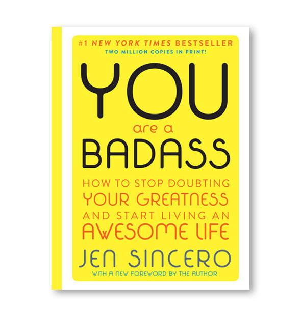 Yellow text-heavy cover of the deluxe edition of You Are a Badass by Jen Sincero