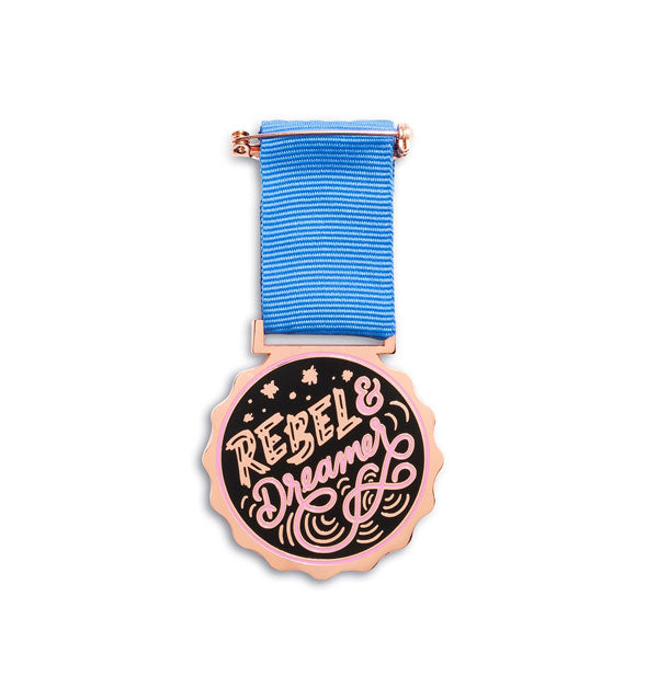Rebel & Dreamer medal with blue ribbon and rose gold accents