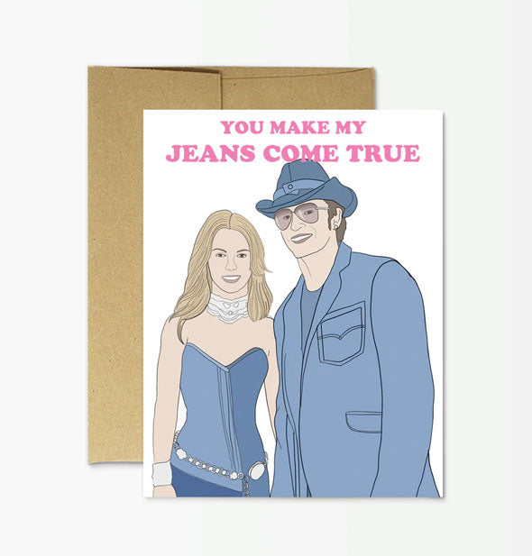 Greeting card on top of kraft envelope features illustration of Britney Spears and Justin Timberlake in matching denim outfits under the message, "You make my jeans come true" in pink lettering
