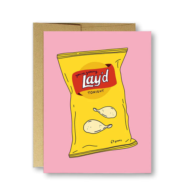Pink Valentine's Day greeting card on top of kraft envelope features chip bag illustration that incorporates the message, "You're getting Lay'd tonight"