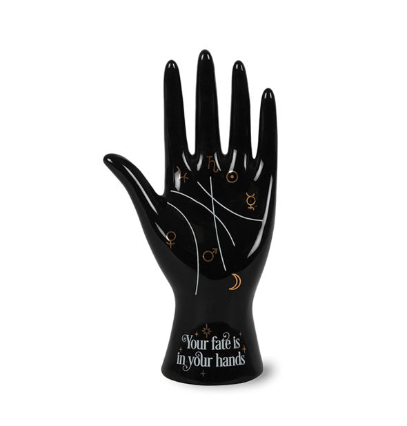 Black hand figurine features white palm lines and gold astrological symbols with the words, "Your fate is in your hands" printed on the wrist