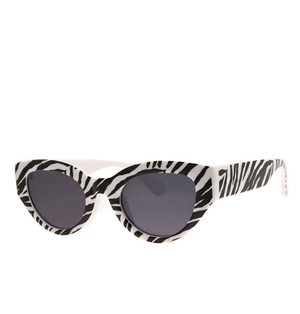 Pair of thick-rimmed zebra print sunglasses with cat eye shape